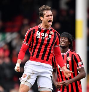Aaron Pressley celebrating his sixth goal of the season for Walsall.