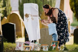 Letters to Heaven post-box opening at Market Drayton Cemetery, organised by Victoria Vespa (In Picture: Victoria Vespa with one of her children, Jude Vespa 2).