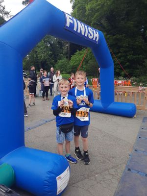 Castlefield Crew members at the finish line