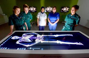 Checking out the digital autopsy table are student paramedics Chloe Nicholls, Emily Turner and Lottie Hadley, student nurse Haifa Abd Al Hakeem and lecturer in adult nursing Charlotte Bradbury