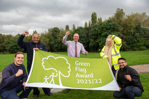 Celebrating the Green Flag Award at Phoenix Park are, from left, ranger team leader Tom Tyler (kneeling), ranger Kameron Paul, Councillor Steve Evans, Wolverhampton Council’s cabinet member for city environment and climate change, ranger Sarah Price and ranger and countryside supervisor Tanzil Awal (kneeling).