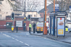 Police at the scene of the murder on a bus in Handsworth