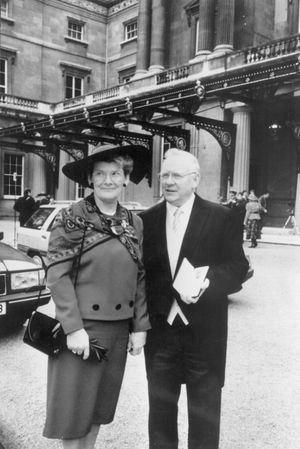 Norman and his wife Mary when he received his OBE in 1992