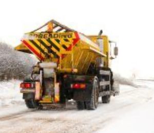 A lorry spreading grit in Powys. Powys County Council