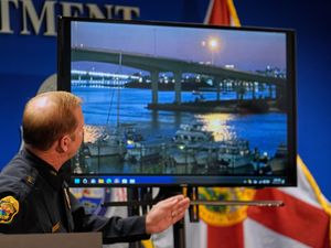 Clearwater, Florida, Police Chief Eric Gandy shows the media the boat crash video