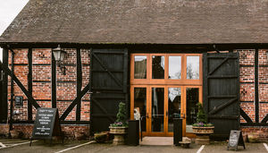 The tithe barn at the Hundred House Hotel is an award-winning wedding venue.