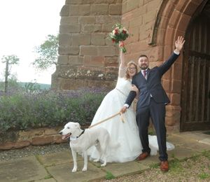 Daniel and Skye Tibbetts with dog Bruno on their wedding day.
