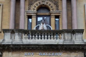 The Wolf in Sheep's Clothing stands at the city's art gallery