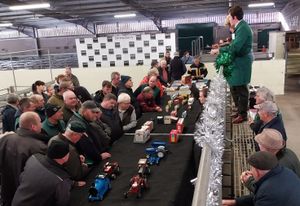 Auctioneer Henry Hyde selling the collection of toy tractors and memorabilia at Shrewsbury Auction Centre.