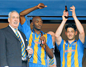 Jubilant scenes at the final whistle as Roland Wycherley takes the applause.