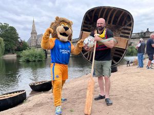 Supporting image for story: Watch as people take to coracles on the River Severn to play football in honour of Shrewsbury Town legend