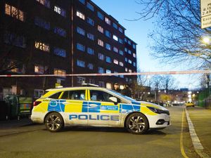 A police car and cordon at the scene of the fatal shooting in Stockwell, south London