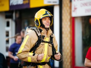 Supporting image for story: Firefighter in full kit completes star-studded Oswestry 10K race
