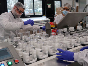 Supporting image for story: Health staff working with factory over Covid cases