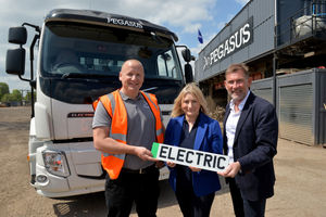 Tony Hall, Martin Cronin and Suzanne Webb MP with the new Volvo FE Electric at the Pegasus depot