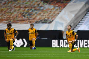 Ruben Neves of Wolverhampton Wanderers and Daniel Podence of Wolverhampton Wanderers take a knee. (AMA)