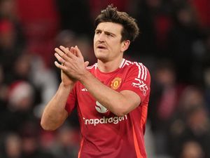 Supporting image for story: Manchester United confirm Harry Maguire will remain at club for another season