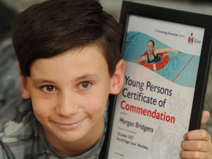 Supporting image for story: Hero youngster gets award after saving friend's life