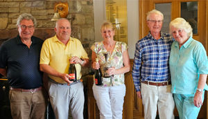 Bridgnorth Golf Club's Champagne Breakfast competition. From left: Men's captain Frazer Barnes, winners Andy & Alison Morgan, president Mike Duke and organiser Vivian Catterall (Picture: Mike Purnell)