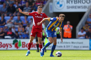 Tom Flanagan of Shrewsbury Town and Shaun Whalley of Accrington Stanley (AMA)