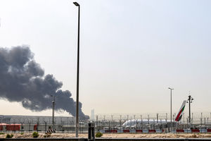 A smoke plume rises from an ongoing fire near Dubai International Airport in Dubai on March 16, 2026. (Photo by AFP via Getty Images) 