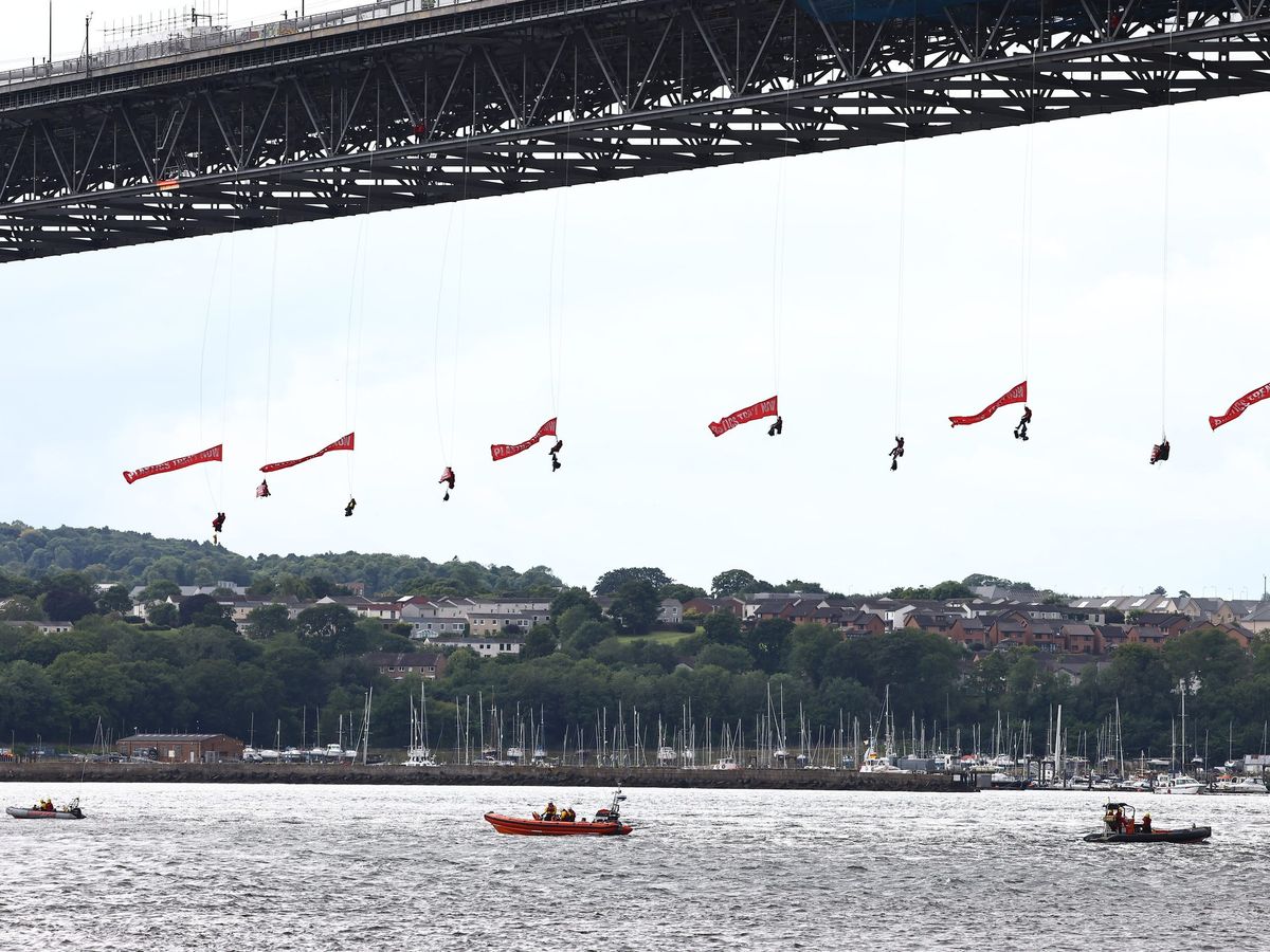 Forth Road Bridge closed as 10 Greenpeace activists hang from ropes