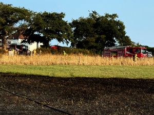 Photographs show the charred aftermath of the large field fire off the A49 in Prees, opposite the Holly Farm Garden Centre. Photo: Market Drayton Fire Station