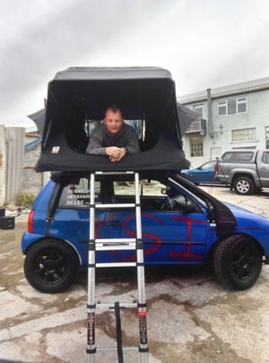 The Volkswagen Lupo features a camper unit on the roof, and a "KSI" signature on it's side