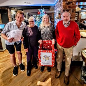 Supporting image for story: Ludlow pub raise a 'whopping' amount of cash for local food bank