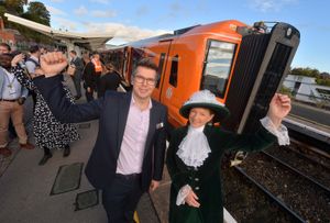 Jonny Wiseman, customer experience director at West Midlands Trains, with High Sheriff of Shropshire Selina Graham and the new train
