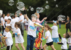 Bubbles galore at the Acorns Bubble Rush at Walsall Arboretum.