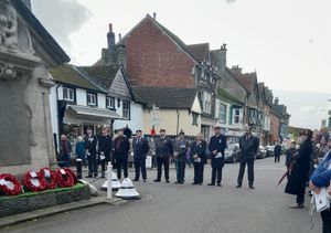 Servicemen, veterans and Royal British Legion members stand at Rhayader’s war memorial. Submitted picture