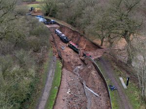 Supporting image for story: Copy of 17 incredible photos show first of three canal boats left stranded in Midland canal breach refloated - and the two which remain