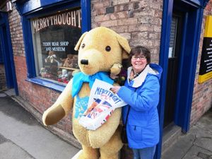 Katharine Shearing with her Merrythought as a child and then again at the Merrythought shop in 2012  