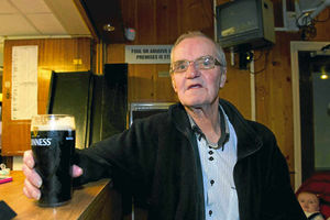 David Bailey enjoys a pint at the Anstice Club in Madeley. The club will be closing its doors for the last time on Friday.