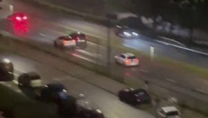 Cars jockey for position as they begin a "drag race"