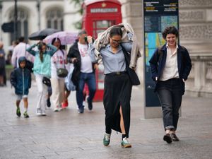 Supporting image for story: Heavy downpours batter the UK as temperatures soar to 30C