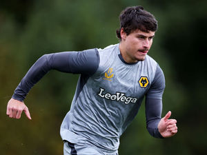 Supporting image for story: Hugo Bueno signs new long-term Wolves deal