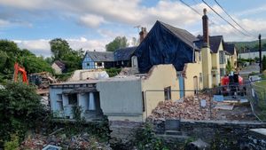 The demolition underway and the rest of the street.