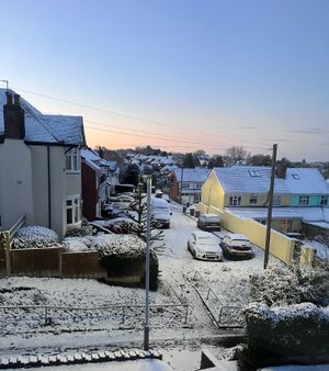 Snow in Penn, Wolverhampton, as the sun rises early this morning