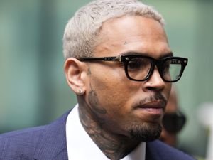 Supporting image for story: Chris Brown arrives at court to enter plea over ‘bottle attack’ charge