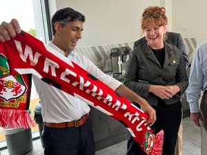 Supporting image for story: Rishi Sunak the Wrexham fan as picture emerges of the PM holding town club's football scarf