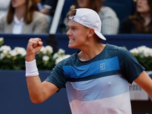 Holger Rune clenches his fist