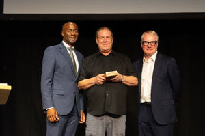 Chris, pictured at the awards ceremony with Mayor of the West Midlands, Richard Parker, and Eastenders' Nicholas Bailey