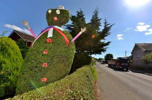 Fred the bush man sporting his new scarf. David Scott now wants to thank the mystery knitter who made the scarf during lockdown.