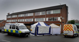 Central Drive outside the takeaway and a row of shops was cordoned off by police