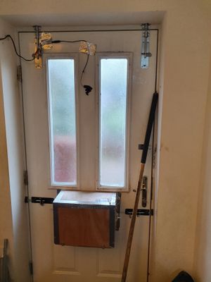 The door was found to be heavily fortified, with several locks in place. Photo: West Midlands Police