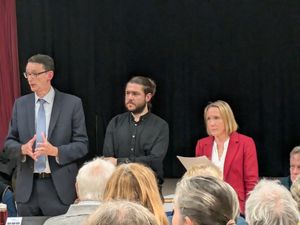 North Shropshire MP, Helen Morgan, along with National Highways representatives Ian Doust (left) and Joe Walmsley (centre), addresses a packed audience at Llanymynech Memorial Hall to discuss what can be done to improve the safety of Llyncylys crossr