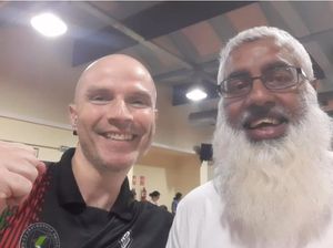 Sijaad Hussain poses with a friend before joining the Global Sumud Flotilla 2025, in Spain