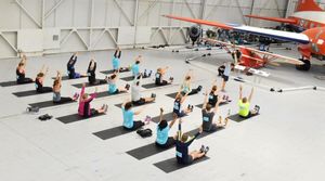 Runners in the Spitfire 10k have a warm-up session at RAF Cosford Museum